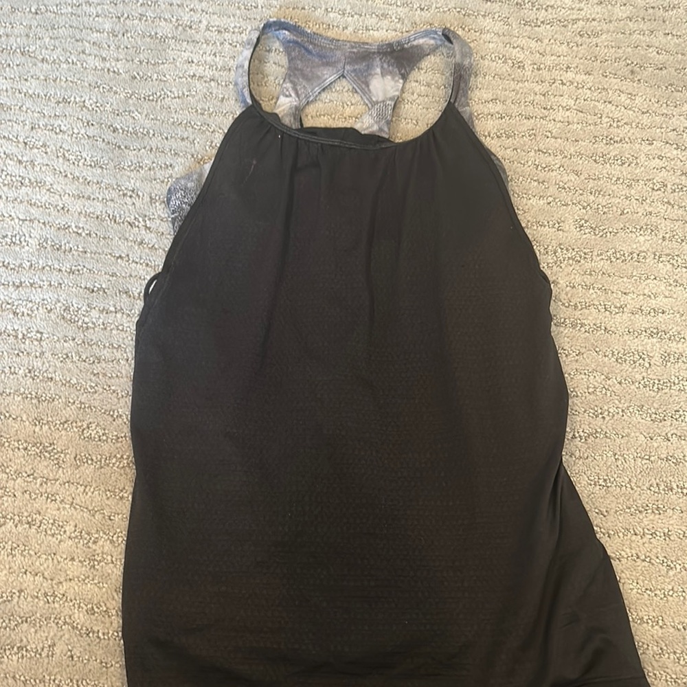 Black and gray Ivivva tank top with built in bra. Size girls medium